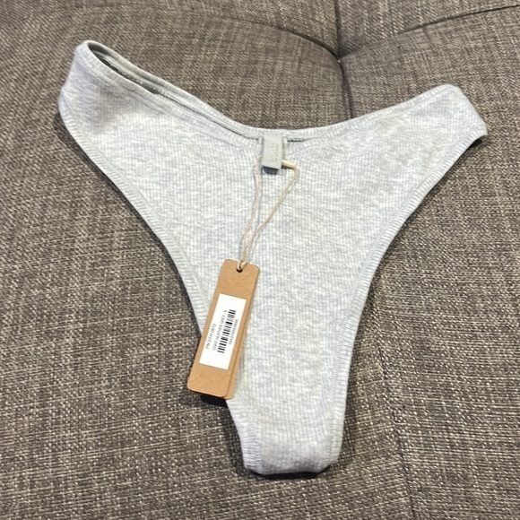 Skims Cotton Rib Dipped Thong - Picture 2 of 3